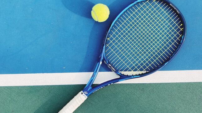 white and blue tennis racket